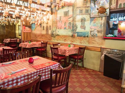 Filippi's pizza grotto little italy - "Vincent DePhilippis Born in New York NY, raised in Naples Italy returned to New York City at the age of 18. Vincent DePhilippis and Madeleine Manfredi from Nimes France met in New York NY (Mamma and 